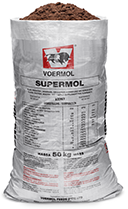 VOERMOL SUPERMOL (V7267). Class: Protein, Energy, Mineral & Trace Mineral Supplement for Ruminants. VOERMOL SUPERMOL is a ready-mixed protein, energy, mineral supplement for ruminants on green veld pastures. Supplies energy & protein, which are often the limiting nutrients on green grazing as well as in certain non-fertilised, cultivated pastures. Provides phosphorus & trace minerals, the first limiting nutrients in green grazing. Part of the trace minerals are supplied in organic form which is highly absorbable & promotes optimal reproduction & growth. Contains high levels of vitamin E, which in combination with selenium is a powerful anti-oxidant which strengthens the animal's immunity. Contains high levels of Vitamin D3, which helps with the absorption of phosphorus & calcium. Ensures adequate intake because it is molasses based & thus palatable. It is not dusty & thus not susceptible to being blown away by the wind.