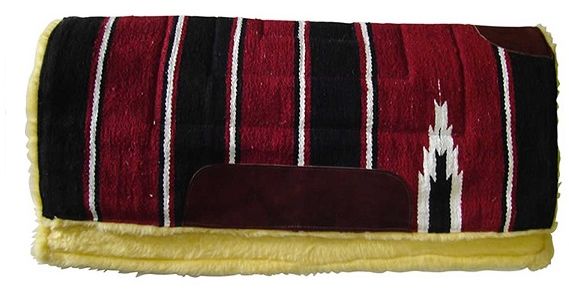 High quality 40mm thick saddle pad. Woven coloured blanket top, fleece under, and felt inner. The Solo Navajo with fleece has a felt inner, and not the more commonly used cheaper sponge, so it will not compress and it will evenly distribute the weight from a western saddle. It prevents the saddle sitting too close to the horse's spine and protects the horse's back.
