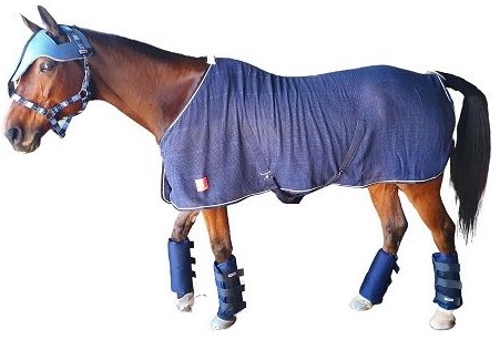 Strong woven cotton mesh sheet that allows the horse to cool down gradually while preventing the muscles from getting a chill and stiffening up. The holes in the breathable mesh material allows the sweat to dry whilst still keeping your horse covered. Fully washable and keeps its shape. 2 clip-on options in the front for size adjustment. Fleece wither protection. Reinforced cotton-lined front for durability and strength. Cross over straps and a tail strap.