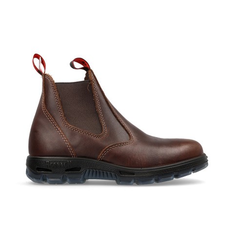 Redback Boots are engineered to make your working life easier, combining lightweight flexibility with heavy-duty durability. At the heart of every Redback boot is our air cushion midsole, crafted from a special compound filled with millions of tiny air bubbles. This innovation boosts shock absorption, returns energy with every step, and reduces overall boot weight. Paired with our anatomically designed last and sole profiles, Redbacks are built to keep you on your feet, longer and more comfortably. But it's not just your feet that'll thank you. Our unique, triple-layer anatomic midsoles help prevent sagging arches (flat feet), reduce overall fatigue, and ease strain on your legs, knees, and lower back. Classic Derby-cut, elastic-sided design. Classic Derby-cut, elastic-sided design. Thicker, tougher leather for maximum durability. Air cushion midsole for superior comfort. Hard-wearing TPU outsole for long-lasting grip. Anatomical fit and torsional heel support for all-day stability.