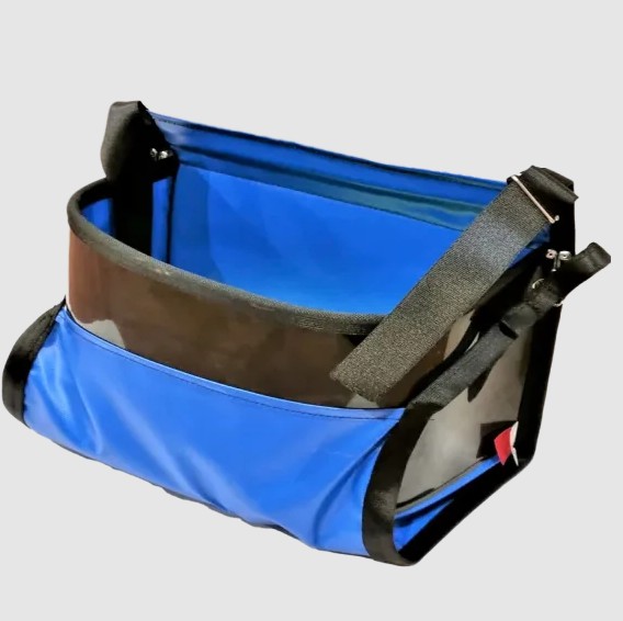 The SP20 is a 20-liter PVC bag featuring a padded design and an open bottom, equipped with a comfortable shoulder sling for easy carrying. It also includes a hard HDPE face for added durability and protection, making it a practical and robust choice for ev