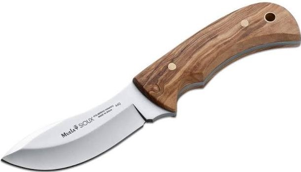The Muela Sioux-10OL is a dependable hunting knife designed for performance and durability in the field. It features a fixed 4.5-inch blade with a full tang construction, providing excellent strength and balance during use. The handle is crafted with attractive olive wood scales, offering both comfort and a natural aesthetic. Completing the knife is a high-quality leather sheath, making it easy to carry and store securely.