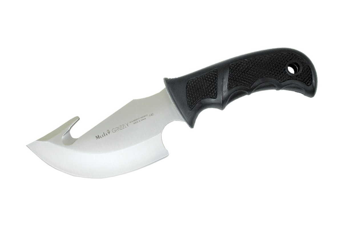 The Muela Grizzly Hunting Knife with guthook is a robust and reliable tool designed for demanding outdoor use. It features a 12 cm blade made from 440 molybdenum vanadium steel, offering excellent strength, durability, and edge retention. The full tang construction enhances balance and resilience, while the rubber handle provides a secure and comfortable grip in various conditions. With an overall length of 23 cm and a weight of 255 grams, this knife is well-suited for hunting tasks. It is supplied with a black leather sheath for safe and convenient carry.