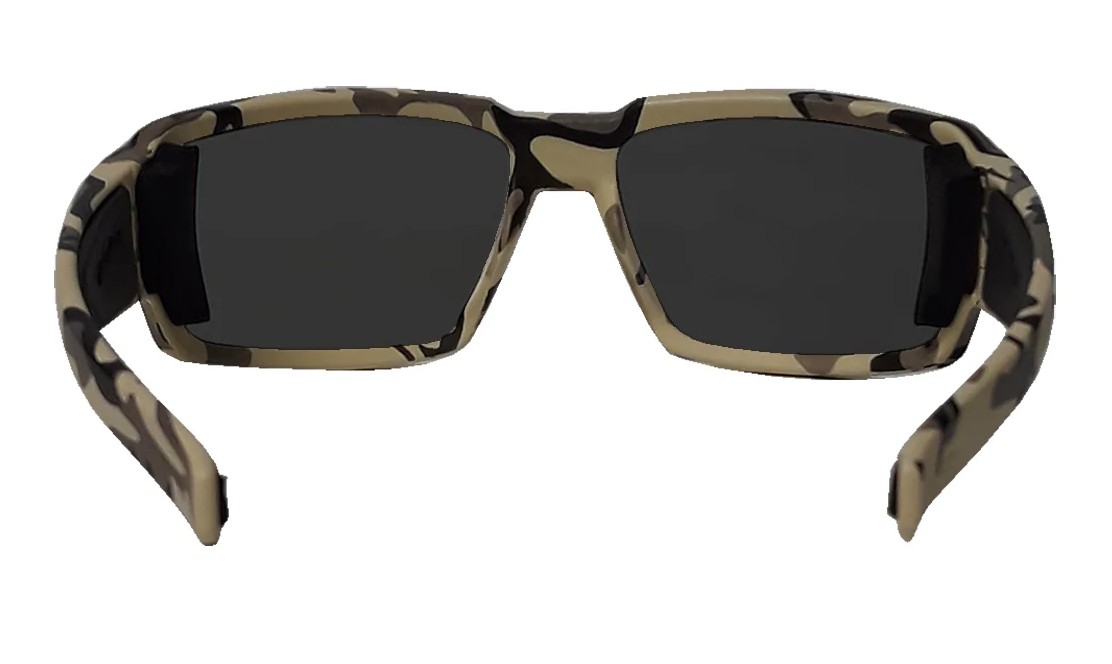 The Raptor sunglasses feature a bold camo frame paired with sleek smoke lenses, creating a modern and versatile look. The lenses help reduce brightness while maintaining clear vision, making them ideal for a variety of outdoor conditions. Built with durability and comfort in mind, these sunglasses offer reliable performance along with a stylish, rugged edge.