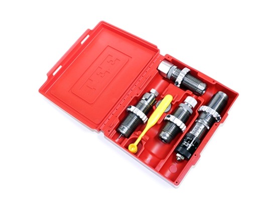 Lee 9mm Luger Pistol 4-Die Set. Includes Carbide Full Length Sizing Die, Bullet Seating Die, Powder Thru Expanding Die, Carbide Factory Crimp Die, Universal Shell Holder, Powder Dipper, and Instructions/Load Data.
