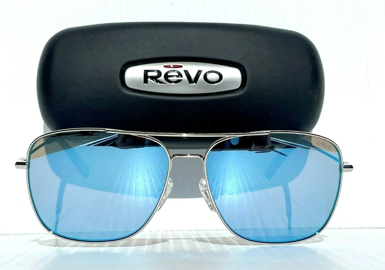 Raptor sunglasses featuring a shiny frame with pearl blue trim and revo (mirror) lenses deliver a bold, sporty style while providing comfortable wear and a sleek modern finish suitable for everyday and outdoor use.